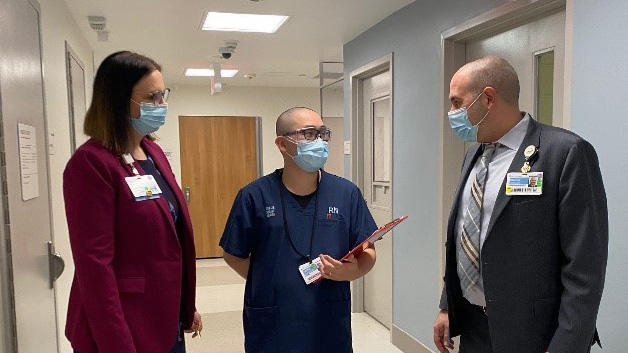 nurses meeting in hallway